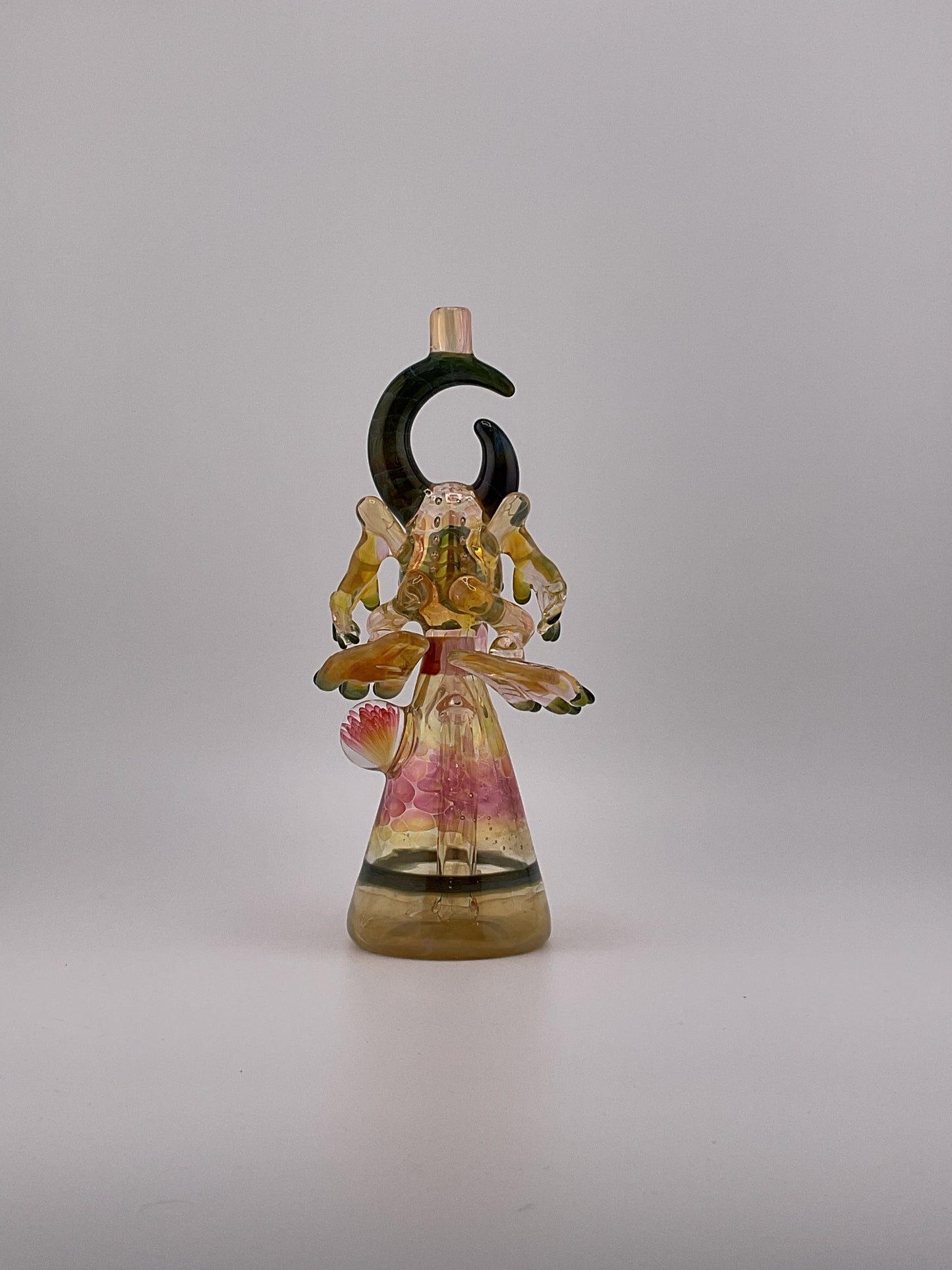 Fumed Jacob jarvis warrior mini tube back view, green horns flower marble pink and yellow hues large eyball with fingernails and toes